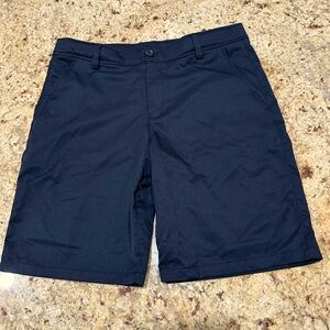 UA boys golf shorts